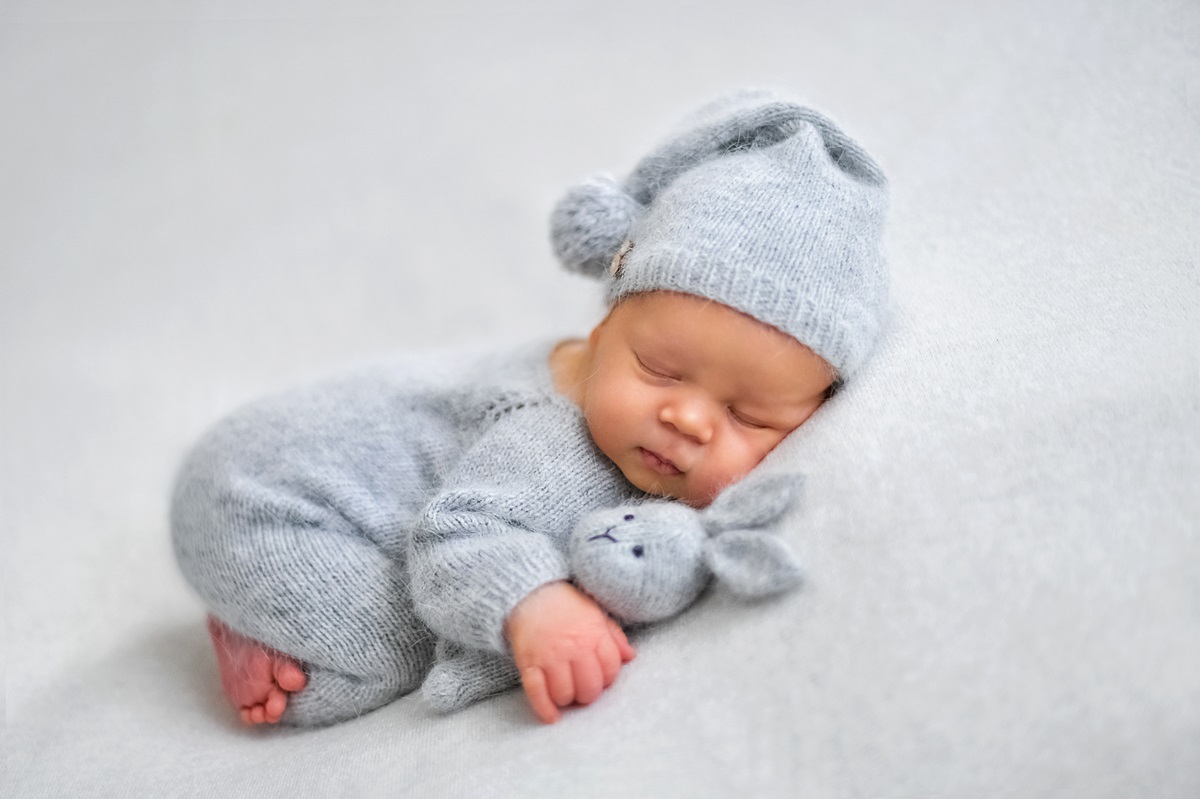 Sleeping baby in hat